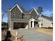 Two-story farmhouse-style home with attached garage at 2401 Terri Creek N Dr # 08, Fuquay Varina, NC 27526