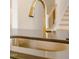 Modern stainless steel kitchen sink with elegant faucet, adding style to the kitchen at 2401 Terri Creek N Dr # 08, Fuquay Varina, NC 27526