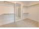 Large walk-in closet with carpeted floor, wall-to-wall shelving, and a full-length mirror at 2401 Terri Creek N Dr # 08, Fuquay Varina, NC 27526