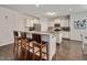 Kitchen with granite countertops, stainless steel appliances, and seating at the island at 2618 Needle Pine Dr, Apex, NC 27539