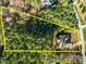 Aerial view of the property lines surrounding the home which is encased in beautiful wooded land at 181 Colonial Ridge Dr, Pittsboro, NC 27312
