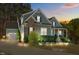 Charming two-story home with brick and siding, a two car garage, and manicured landscaping at 181 Colonial Ridge Dr, Pittsboro, NC 27312