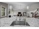 View from the kitchen island showcasing the open floor plan, flowing into the living room at 181 Colonial Ridge Dr, Pittsboro, NC 27312