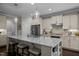 Gourmet kitchen featuring a large island, stainless steel appliances, and plenty of cabinet space at 181 Colonial Ridge Dr, Pittsboro, NC 27312