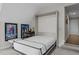 Fully extended murphy bed with a clean look, conveniently located near the hallway at 181 Colonial Ridge Dr, Pittsboro, NC 27312