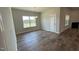 This is a dining room with wood flooring, and a chandelier lighting fixture at 60 Falls Of The Cape Dr, Lillington, NC 27546