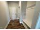 Entryway with wood flooring and a white bench at 60 Falls Of The Cape Dr, Lillington, NC 27546
