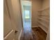 Walk-in pantry with wire shelving, offering ample storage space at 60 Falls Of The Cape Dr, Lillington, NC 27546