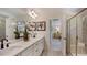 Double vanity bathroom with a large shower at 23 Evie Ct, Angier, NC 27501