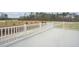 Private deck with white railing and wooded views at 444 Billingshurst Way, Knightdale, NC 27545