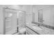 Stylish bathroom with a glass-enclosed shower and granite countertop vanity provides a modern and sleek design at 657 Sun Meadow Dr, Wake Forest, NC 27587