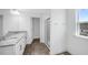 Modern bathroom features double sink vanity, tile flooring, glass enclosed shower and plenty of storage at 657 Sun Meadow Dr, Wake Forest, NC 27587