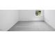 The bedroom offers neutral carpeting, a double window for natural light, and ample closet space at 657 Sun Meadow Dr, Wake Forest, NC 27587