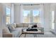 Inviting living area with comfortable seating, a neutral color palette, and ample light at 657 Sun Meadow Dr, Wake Forest, NC 27587