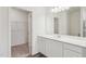 Bathroom boasts a vanity with a quartz countertop at 276 Babbling Brook Dr, Clayton, NC 27520