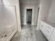 Bathroom awaiting finishing touches, complete with shower and vanity at 32 Tanseyleaf Dr, Smithfield, NC 27577