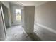 Bedroom featuring bright windows and ample space, ready for customization and finishing at 32 Tanseyleaf Dr, Smithfield, NC 27577