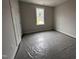 Simple bedroom with neutral walls and window at 39 N Rowsham Pl, Smithfield, NC 27577