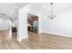 Dining room with hardwood floors, chandelier, kitchen view at 6416 Truxton Ln, Raleigh, NC 27616