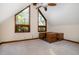 Empty bedroom with a ceiling fan, large windows, and neutral colored walls at 106 Springbrook Pl, Cary, NC 27518