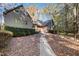 Exterior of two story home with mature trees and landscaping at 106 Springbrook Pl, Cary, NC 27518