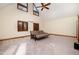 Large living room features high ceilings, carpet, a sofa, windows, and natural light at 106 Springbrook Pl, Cary, NC 27518