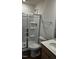 Clean bathroom features a shower stall and a toilet, offering a functional and accessible space at 1103 Mountain Crown St, Durham, NC 27703