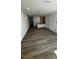 Spacious living room featuring wood flooring and ample natural light, great for entertaining at 1103 Mountain Crown St, Durham, NC 27703