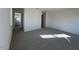 Large bedroom featuring a hall to the en-suite bathroom, natural light and neutral carpeting at 120 Parker Ln, Mebane, NC 27302