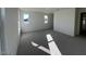 Expansive bedroom showcases numerous windows providing plenty of natural light and neutral carpeting at 120 Parker Ln, Mebane, NC 27302