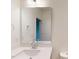 A stylish bathroom with a modern sink, vanity, toilet and mirror at 1216 Dimaggio Dr # 29, Raleigh, NC 27616