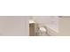 A bright bathroom featuring a toilet, shower and cabinet with a sink at 1216 Dimaggio Dr # 29, Raleigh, NC 27616
