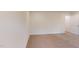Unfurnished bedroom with carpet floors and an entry door at 1216 Dimaggio Dr # 29, Raleigh, NC 27616