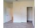 A spacious bedroom with laminate floors and closets for storage at 1216 Dimaggio Dr # 29, Raleigh, NC 27616