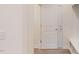 Hallway showing access to closets and other rooms at 1216 Dimaggio Dr # 29, Raleigh, NC 27616