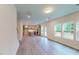 Open-concept living room with bright natural light and view to the kitchen at 1216 Dimaggio Dr # 29, Raleigh, NC 27616