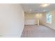 Bright and airy loft area with neutral carpet and recessed lighting is ready for your personal touches at 1216 Dimaggio Dr # 29, Raleigh, NC 27616