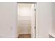 Open pantry with white wire racks for organized storage at 1216 Dimaggio Dr # 29, Raleigh, NC 27616