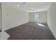 Large bedroom with neutral carpet, recessed lighting, and natural light at 1221 Dimaggio Dr # 10, Raleigh, NC 27616