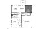 Detailed first floor floor plan with layout of kitchen, living spaces, study, and garage at 1221 Dimaggio Dr # 10, Raleigh, NC 27616