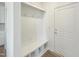 Mudroom featuring a bench, cubbies and access to an exterior door at 1221 Dimaggio Dr # 10, Raleigh, NC 27616