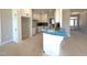 Bright eat-in kitchen with white cabinets, tile backsplash, and modern appliances at 1665 S Old Carriage Rd, Rocky Mount, NC 27804