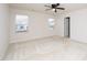 Spacious bedroom with neutral carpet, natural light, and ceiling fan at 2117 Attend Xing, Fuquay Varina, NC 27526