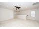 Bright bonus room with a ceiling fan, plush carpeting, and natural light at 2117 Attend Xing, Fuquay Varina, NC 27526