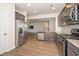 Spacious kitchen featuring stainless steel appliances and hardwood floors at 2117 Attend Xing, Fuquay Varina, NC 27526
