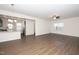 Bright and airy living room with vinyl wood plank flooring and an open floor plan at 2117 Attend Xing, Fuquay Varina, NC 27526