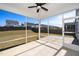 Covered screened patio overlooking the spacious backyard and neighborhood at 2117 Attend Xing, Fuquay Varina, NC 27526