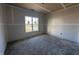 Unfinished bedroom with a window offering natural light at 215 Ruskin Dr, Smithfield, NC 27577