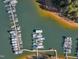 Aerial view of a marina with numerous boats and docks at 3217 Satterwhite Point Rd, Henderson, NC 27537