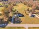 Aerial view of a house and surrounding properties at 3217 Satterwhite Point Rd, Henderson, NC 27537